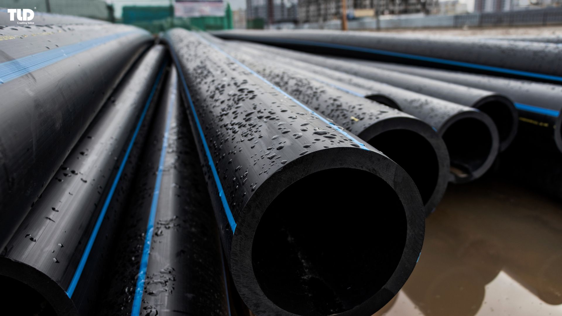 Flexible, and corrosion-resistant HDPE pipes stacked and ready for long-lasting infrastructure applications